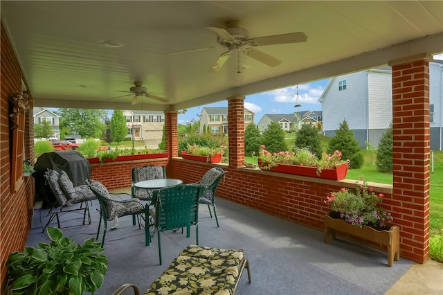 view of patio / terrace featuring ceiling fan