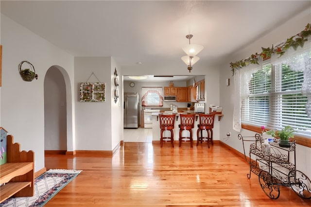 dining room with light wood-type flooring