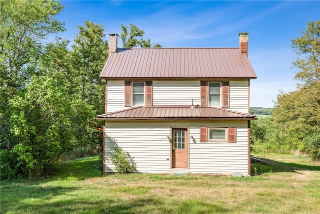 view of front of house with a front lawn