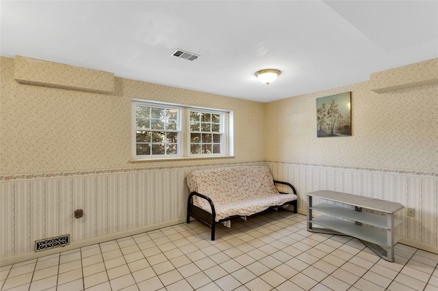 sitting room with light tile patterned floors