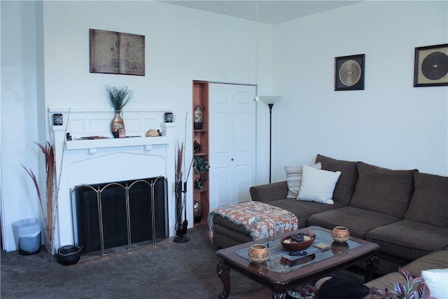 living room featuring dark colored carpet