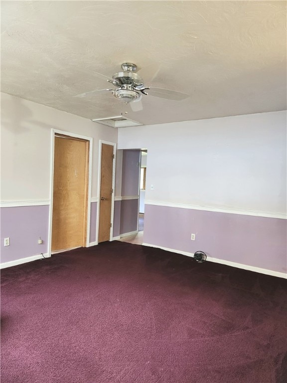 carpeted empty room with ceiling fan