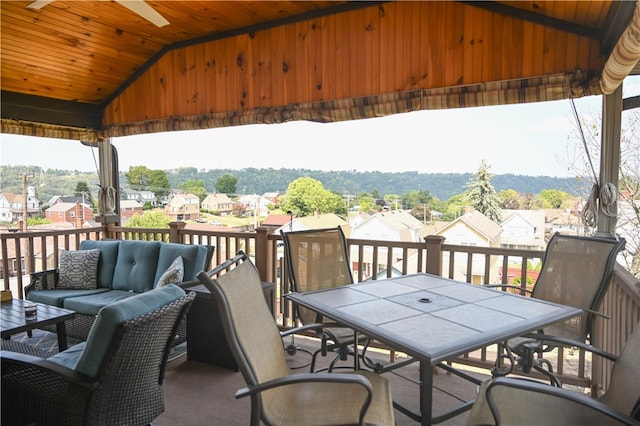 exterior space featuring outdoor lounge area and a gazebo