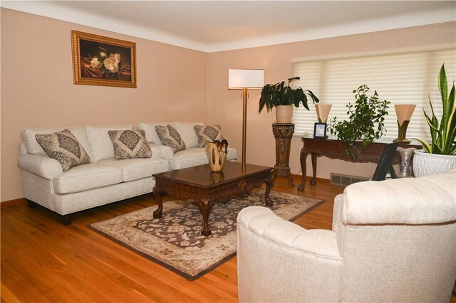 905 Morton Ave, Port Vue, PA 15133 - living room featuring wood finished floors