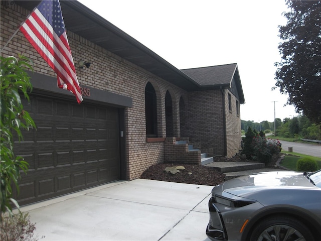 view of property exterior with a garage