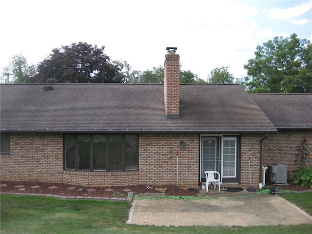 view of front of home featuring central AC unit