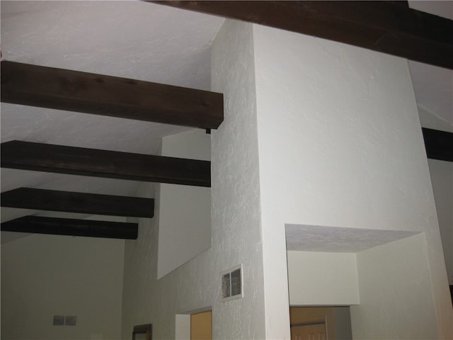 details featuring beam ceiling