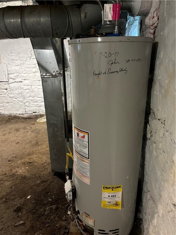 utility room with water heater