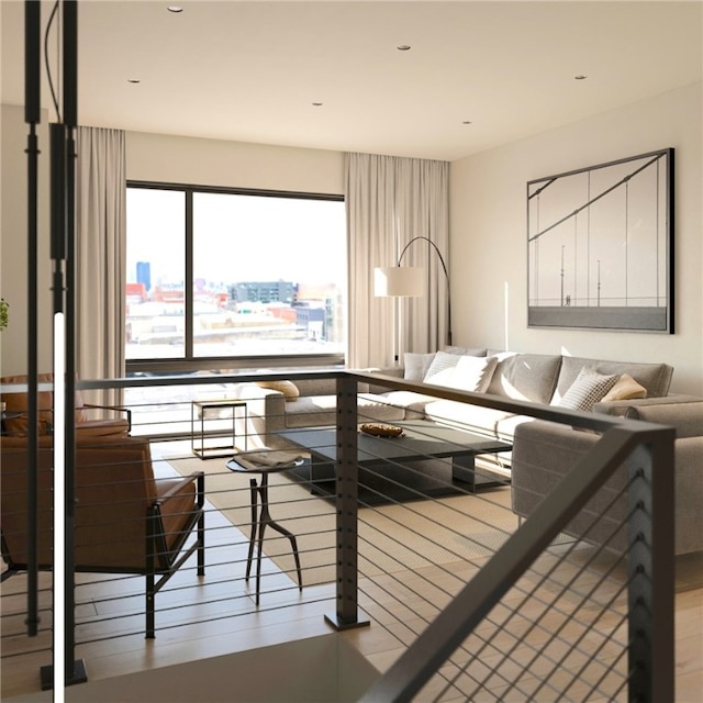 living room featuring plenty of natural light and hardwood / wood-style floors