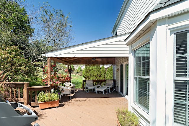 wooden deck featuring a gazebo