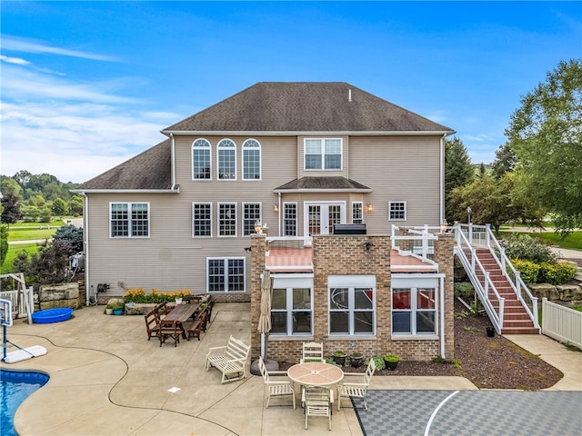 back of property featuring a patio area