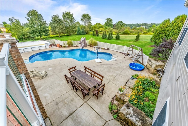 view of swimming pool featuring a patio