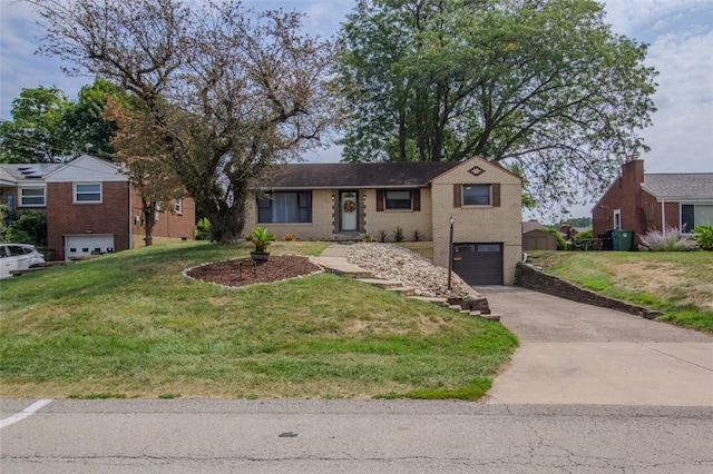 view of front of property featuring a garage and a front yard