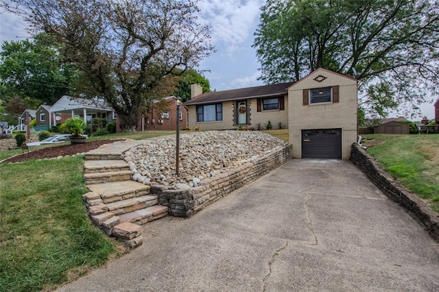 view of front of house featuring a storage shed and a garage