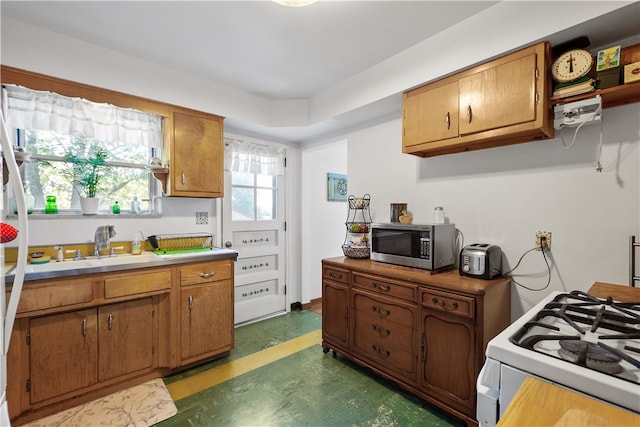 kitchen featuring white gas stove