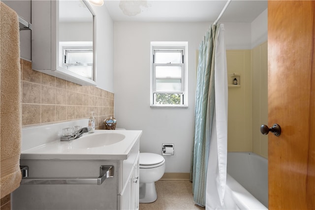 full bathroom featuring backsplash, vanity, shower / tub combo with curtain, and toilet