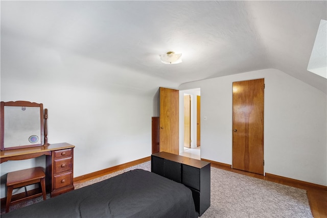 bedroom with vaulted ceiling