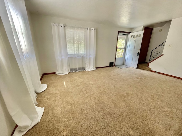 view of carpeted spare room