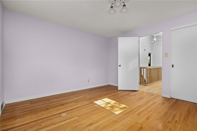 unfurnished bedroom featuring a closet and light wood-type flooring