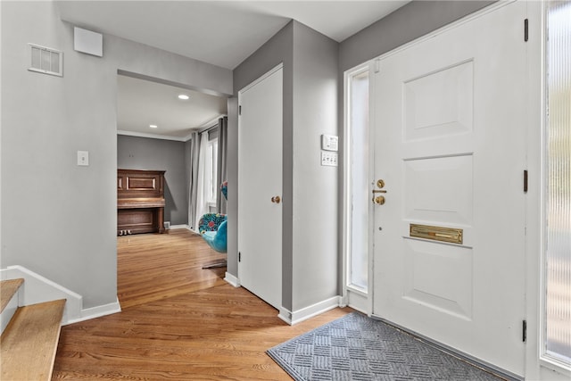 foyer featuring hardwood / wood-style floors