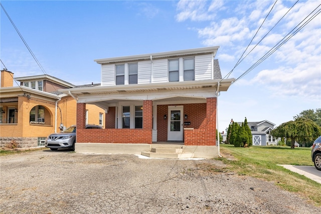 view of front of property featuring covered porch