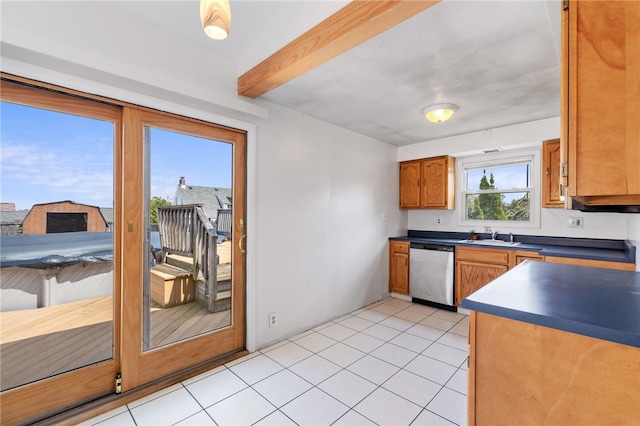 kitchen with dishwasher, sink, light tile patterned floors, and beamed ceiling