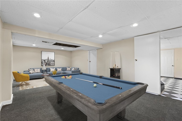 recreation room featuring pool table, a paneled ceiling, and dark colored carpet