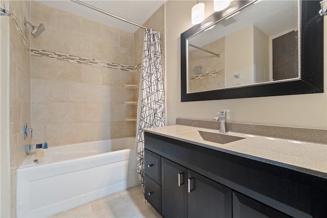 bathroom featuring vanity, shower / bath combination with curtain, and tile patterned flooring