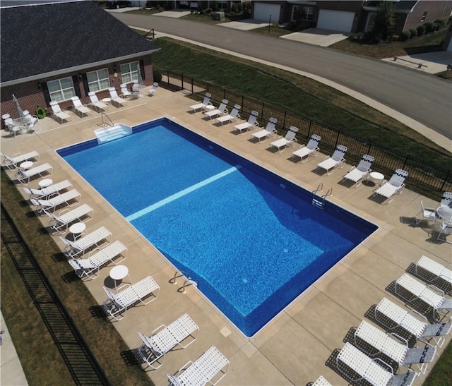 view of swimming pool featuring a patio