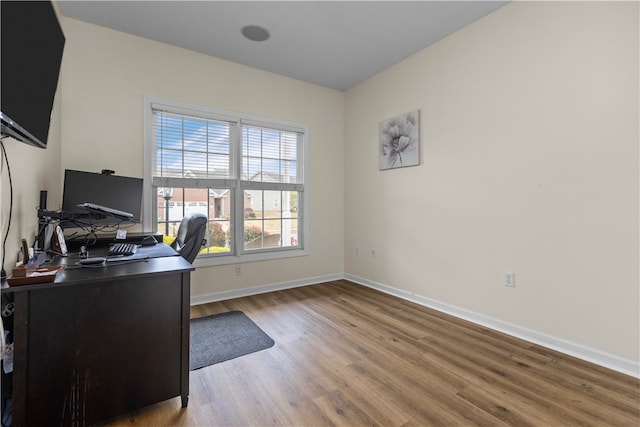 home office featuring hardwood / wood-style flooring