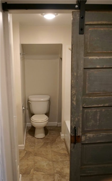 bathroom with toilet and plus walk in shower