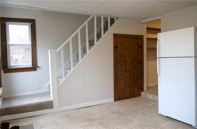 staircase with carpet