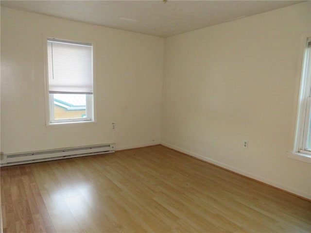 8 Morgan St, South Fayette, PA 15031 - spare room with a baseboard radiator, light wood-style flooring, and baseboards