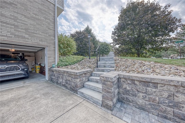 view of patio / terrace with a garage