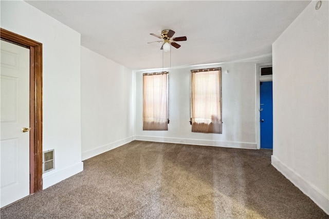 empty room featuring carpet and ceiling fan