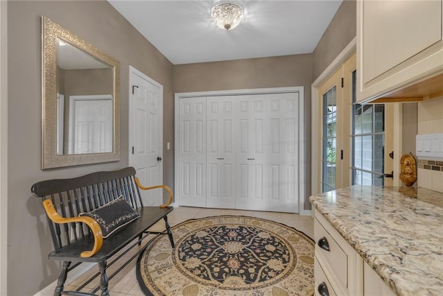 44868 Warner Rd, Pa, PA 16354 - foyer entrance featuring light tile patterned floors and baseboards