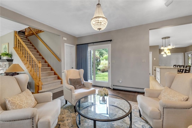 44868 Warner Rd, Pa, PA 16354 - living room with a chandelier, baseboard heating, stairway, and light wood-style flooring