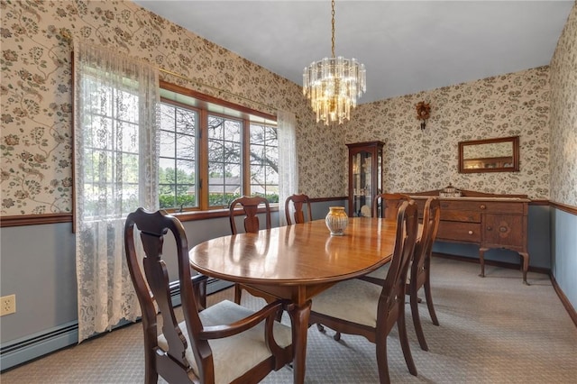 44868 Warner Rd, Pa, PA 16354 - dining area with a baseboard radiator, wallpapered walls, a wainscoted wall, a chandelier, and light colored carpet