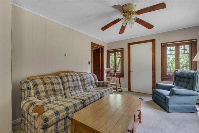 44868 Warner Rd, Pa, PA 16354 - living room featuring light colored carpet, a ceiling fan, ornamental molding, french doors, and baseboards