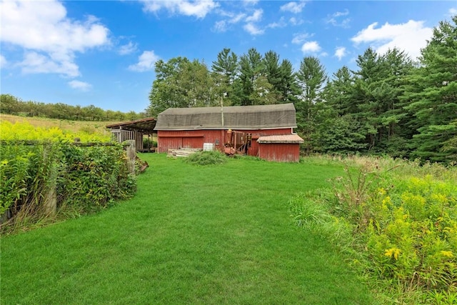 44868 Warner Rd, Pa, PA 16354 - view of green lawn featuring an outdoor structure and a barn