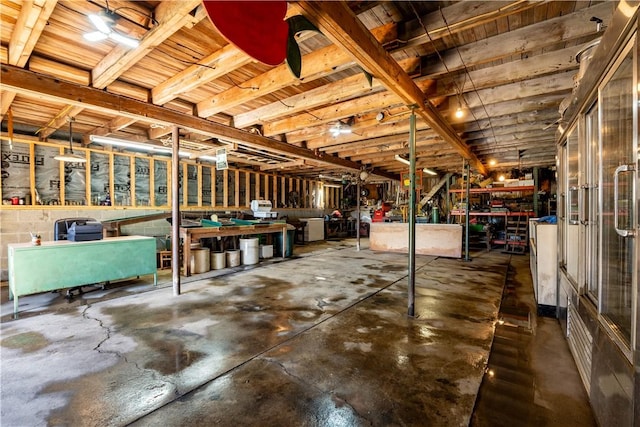 44868 Warner Rd, Pa, PA 16354 - misc room with unfinished concrete flooring and a workshop area
