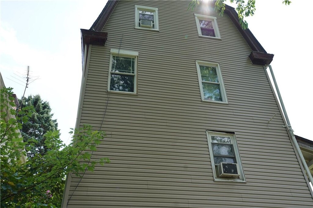 view of property exterior with cooling unit