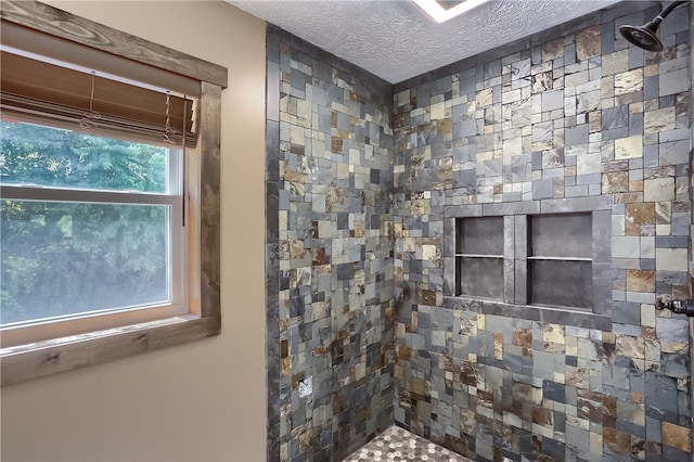 bathroom featuring a textured ceiling