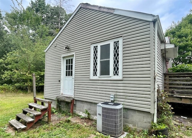 view of property exterior with cooling unit