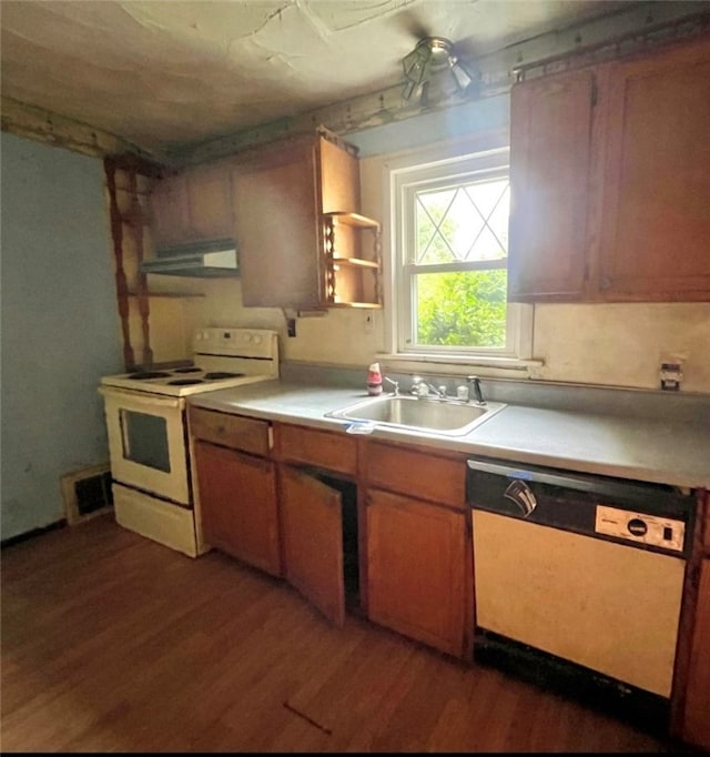 kitchen featuring sink, ventilation hood, white appliances, and dark hardwood / wood-style flooring