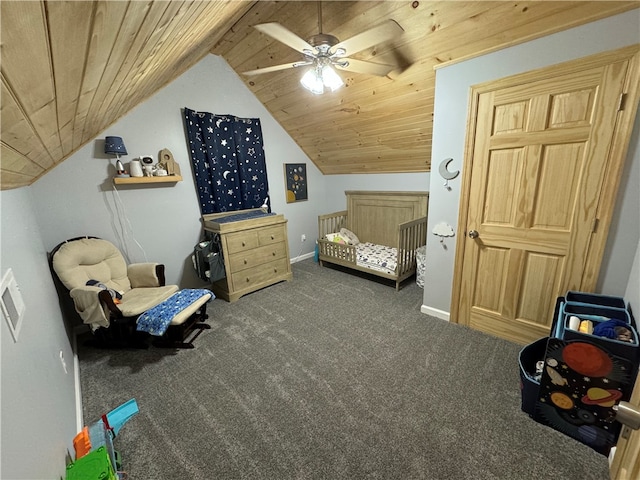 bedroom featuring wood ceiling, ceiling fan, a nursery area, and carpet floors