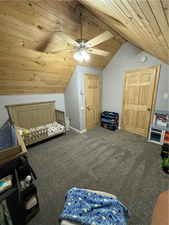 interior space featuring lofted ceiling, ceiling fan, and wooden ceiling