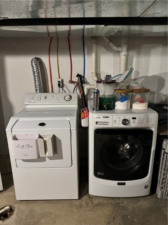 laundry area featuring washing machine and dryer