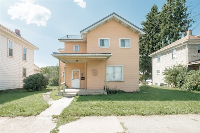 view of front of house with a front yard