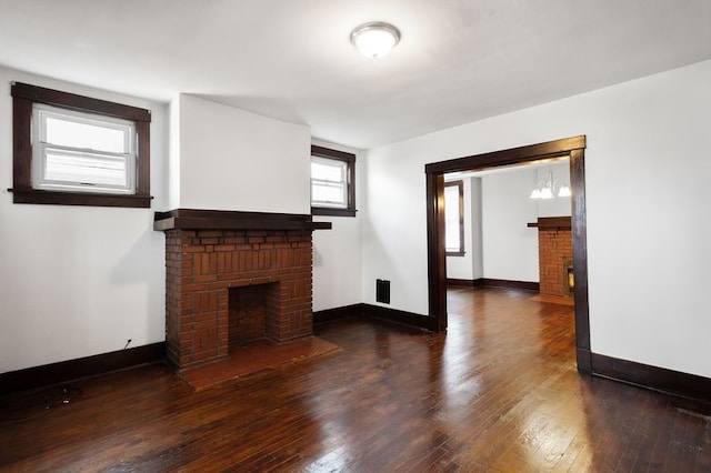 622 Bellaire Ave, Brookline, PA 15226 - unfurnished living room featuring a fireplace, wood finished floors, and baseboards